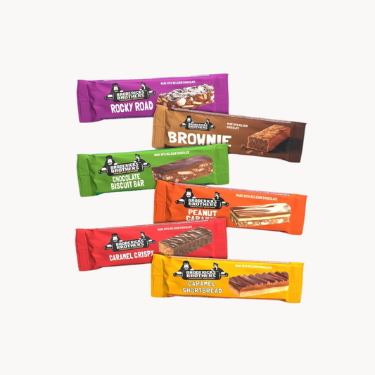Packshot Brodericks Kuchenriegel: Sorten Choc & Salted Caramel Rice Crispy Bar, Cake Bar Crispy Peanut Butter, Cake Bar Caramel Slice, Cake Bar Rocky Road, Brownie with Chocolate Coating, Cake Bar Tiffin Slice