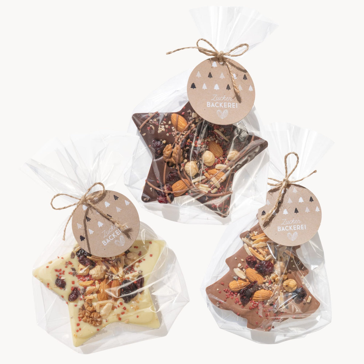 Weihnachtsschokolade: Schoko-Baum Vollmilchschokolade, Schoko-Sternchen weiße Schokolade und Zartbitter mit Nüssen und getrockneten Beeren