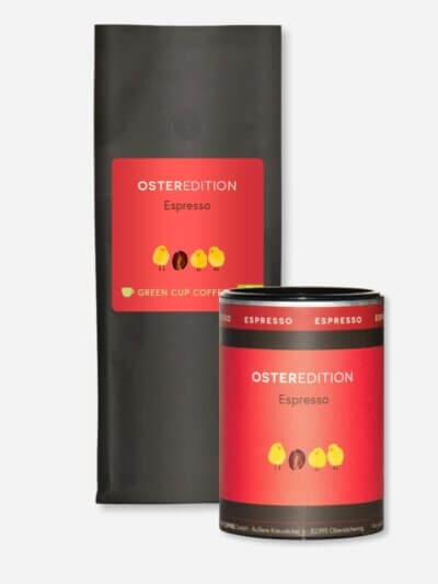 Osterespresso - Hausfreund BIO: Packshots der 1kg Tüte und 227g Dose schwarz